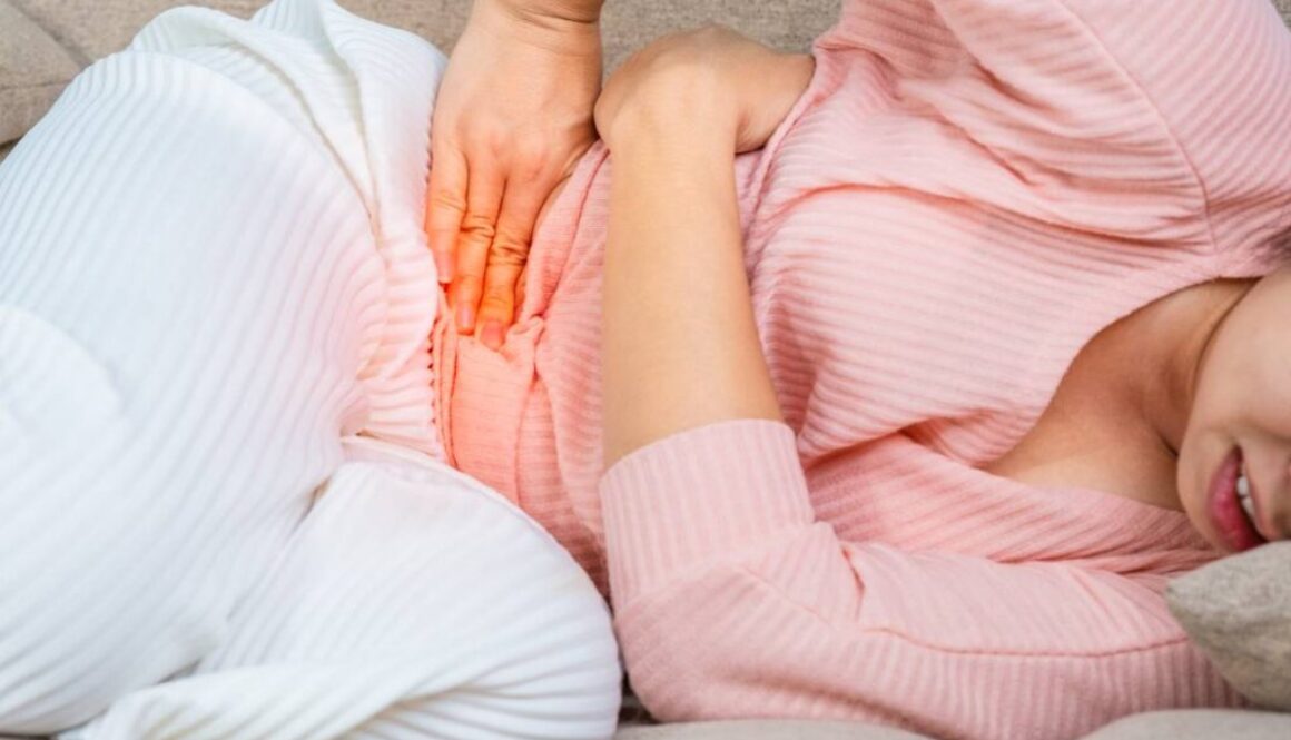 low-section-woman-lying-bed (1)