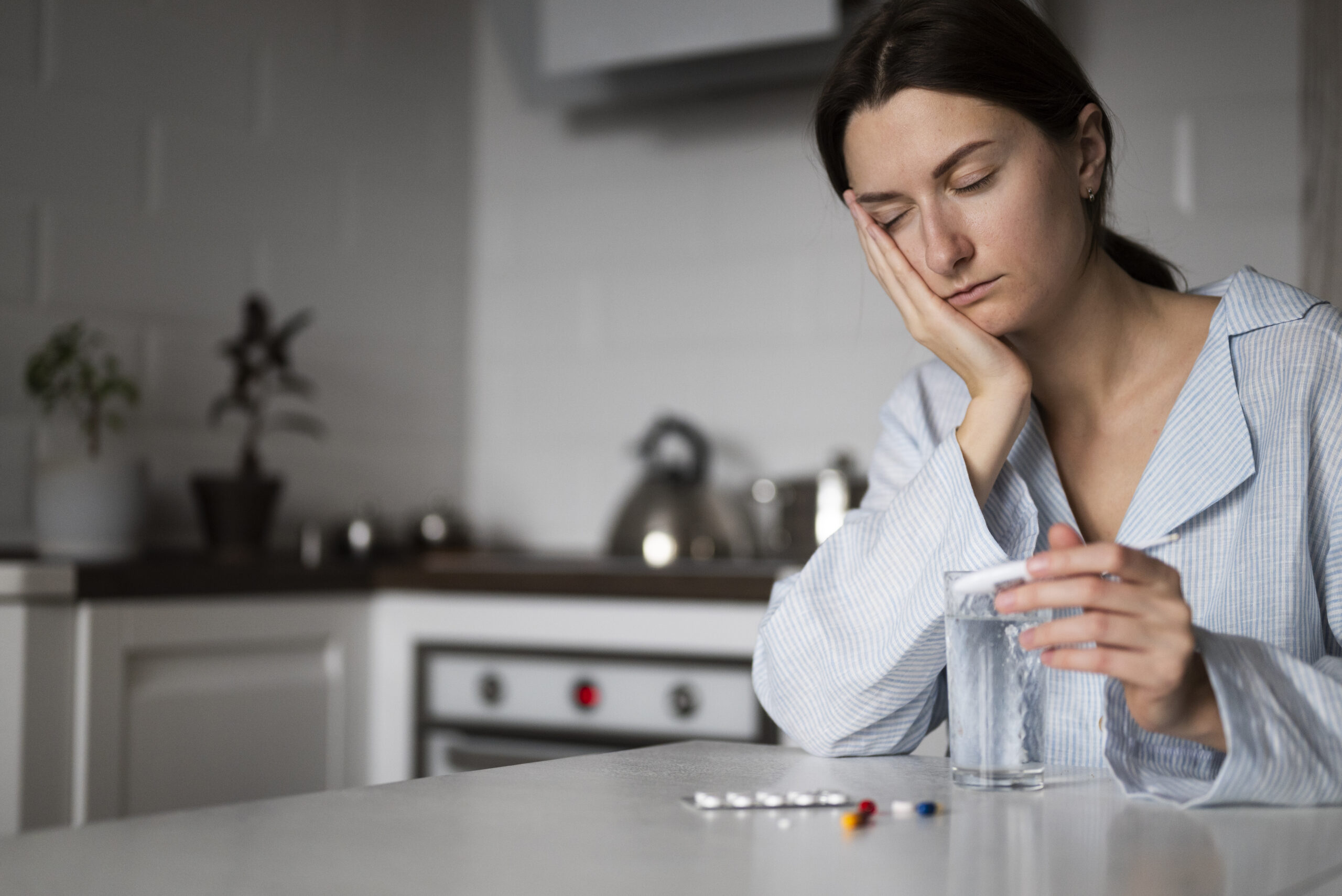 medium-shot-woman-holding-thermometer